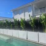 Garden Divider troughs pool side banana plants