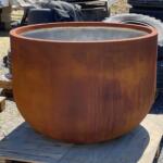 Huge garden pot in fake rust