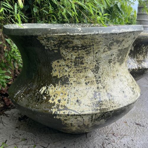 Crafted by hand from high-quality Thai limestone, the Cauldron-Shaped Planter offers durability and distinctive texture, with natural tones that evolve beautifully over time. Its organic, raw finish complements the natural surroundings of tropical and modern gardens alike, making it the perfect vessel for large plants, trees, or even as a decorative feature in courtyards and entryways.