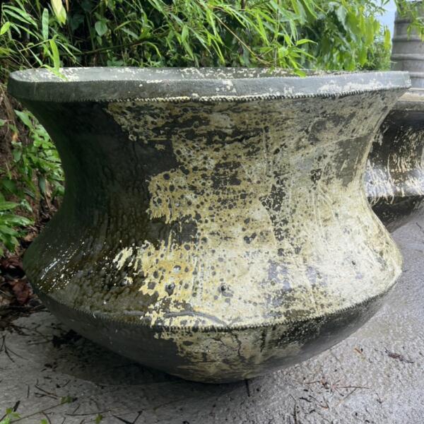 Crafted by hand from high-quality Thai limestone, the Cauldron-Shaped Planter offers durability and distinctive texture, with natural tones that evolve beautifully over time. Its organic, raw finish complements the natural surroundings of tropical and modern gardens alike, making it the perfect vessel for large plants, trees, or even as a decorative feature in courtyards and entryways.