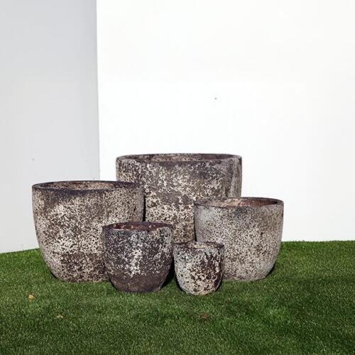 Pompeii Egg Planter with black and white volcanic texture finish, egg cup-shaped ceramic planter for indoor and outdoor use, available with Sydney and Canberra delivery