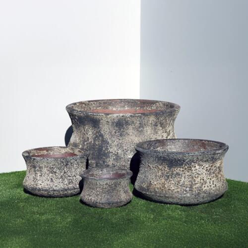Pompeii Lotus Planter with black and white volcanic texture finish, shallow bowl-shaped ceramic planter with flared petal edges for indoor and outdoor use, available with Sydney and Canberra delivery
