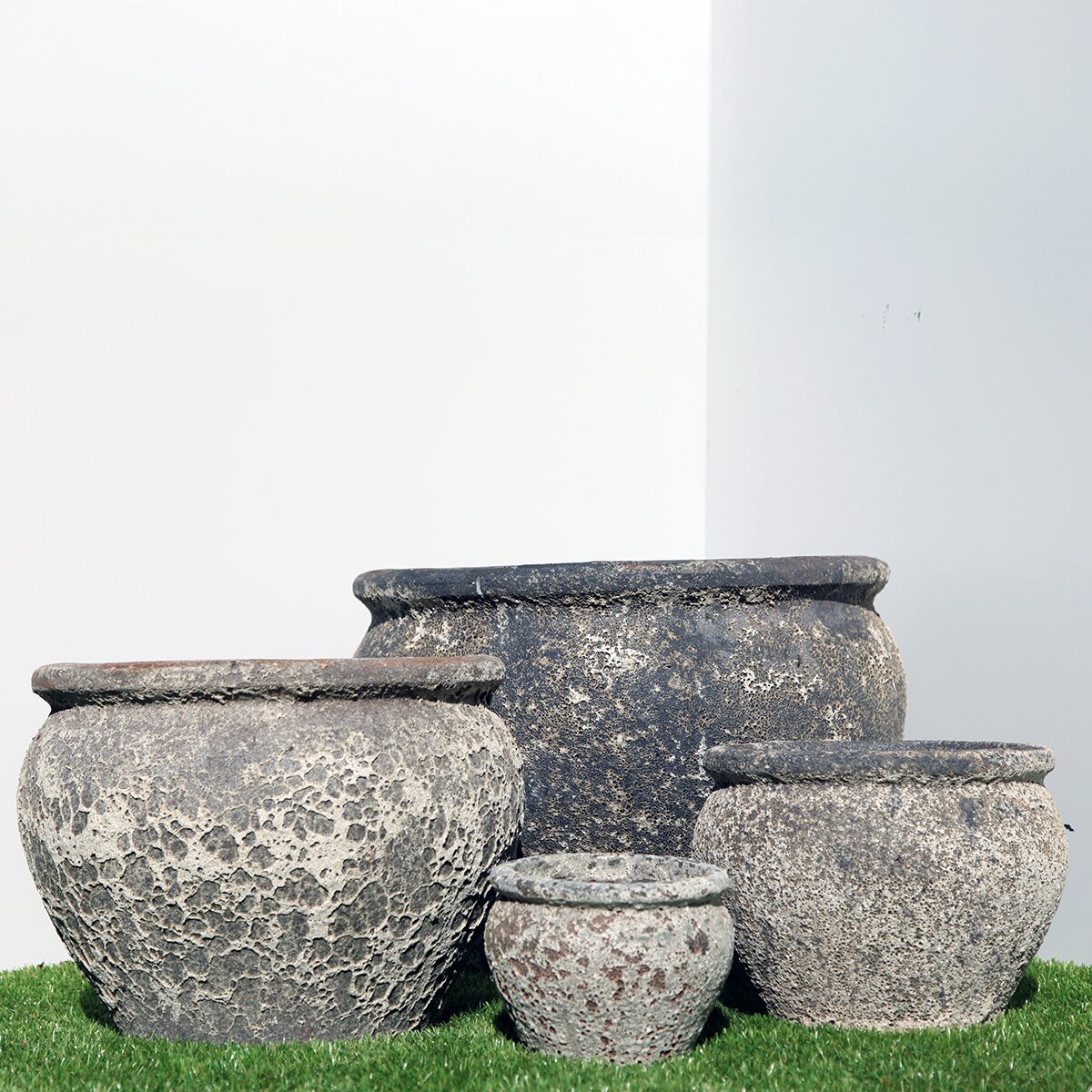 Pompeii Belly Planter with black and white volcanic texture finish, rounded ceramic planter for indoor and outdoor use, available with Sydney and Canberra delivery