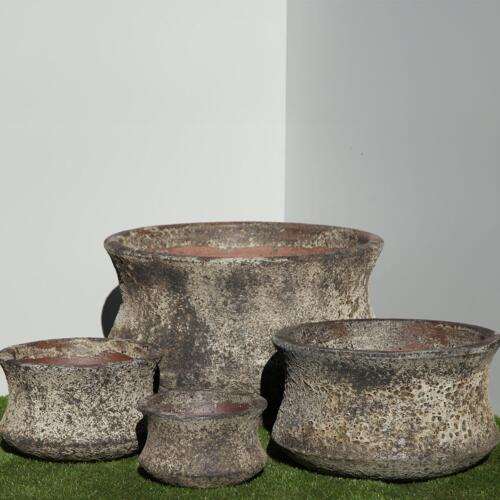 Pompeii Lotus Planter with black and white volcanic texture finish, shallow bowl-shaped ceramic planter with flared petal edges for indoor and outdoor use, available with Sydney and Canberra delivery
